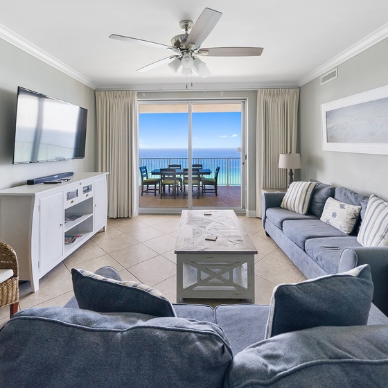 Unwind in your oceanfront living room where plush seating and stunning sea views create your perfect coastal retreat.