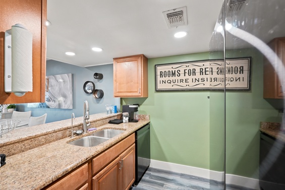 Your well-equipped kitchen features granite countertops, stainless steel appliances, and plenty of prep space—perfect for brewing morning coffee or whipping up meals during your stay.