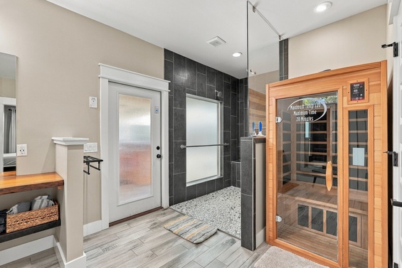 Your private wellness retreat awaits, with a sleek shower and your own infrared sauna for ultimate relaxation after a day exploring the area.
