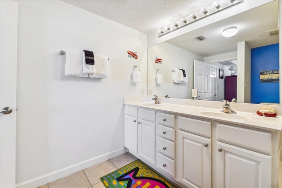 Double vanities and plenty of lighting
