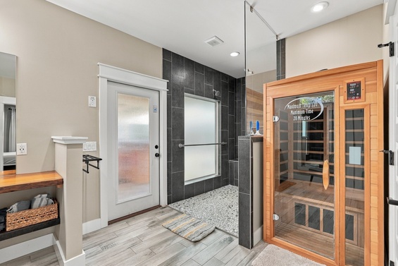 Unwind in your own private spa sanctuary, complete with a personal sauna and walk-in steam shower for pure relaxation after a long day.