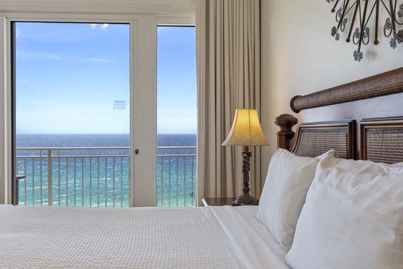 Luxurious master suite with beach views