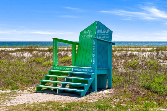 Iconic Mexico Beach landmark on white sand with Gulf views and coastal dunes marking this beautiful Florida beachfront destination.