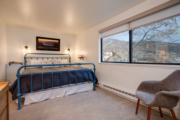 Wake up to stunning mountain views from your cozy bedroom retreat. Sink into the plush bedding and start each morning gazing at the scenic peaks framed perfectly by your window.