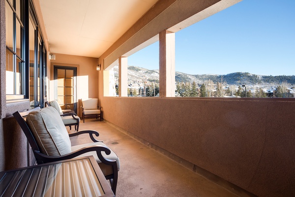 Settle into your private balcony and soak in stunning mountain vistas. Crisp alpine air, cozy seating, and serene winter views create the perfect spot for morning coffee or evening relaxation.