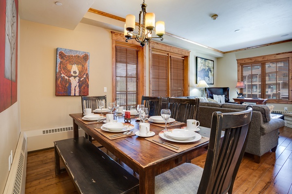 Gather around this spacious dining table with seating for eight, where meals become moments and your group can reconnect over coffee or wine in the warm, mountain-modern atmosphere.
