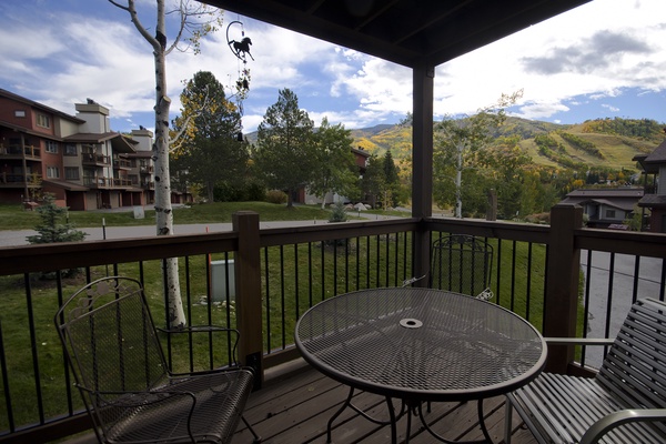 Scenic mountain view from your private terrace where golden aspens frame the distant peaks. Perfect spot for morning coffee or evening relaxation with nature's beauty as your backdrop.