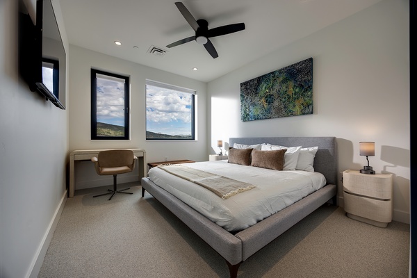 Wake up to stunning mountain views through your bedroom windows, where natural light and modern comfort create the perfect retreat for restful mornings and peaceful nights.