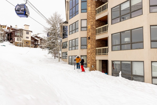 This ski-in/ski-out property sits at the base of the slopes with direct gondola access, offering a prime mountain village location for winter sports enthusiasts.