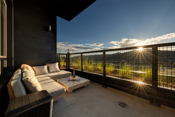 Step onto your private terrace where the mountains frame the horizon and golden light spills across the landscape. Sink into the plush outdoor seating with a drink in hand and let the breathtaking scenery wash over you.