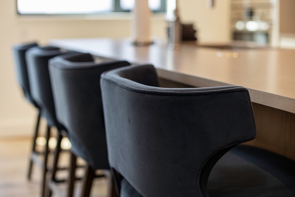 Pull up a seat at the sleek counter—your morning coffee or evening glass of wine has never looked so good with these modern bar stools.