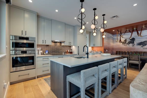 Your gourmet kitchen blends contemporary style with full-size appliances and a spacious island where you can gather for meals or unwind with a glass of wine.