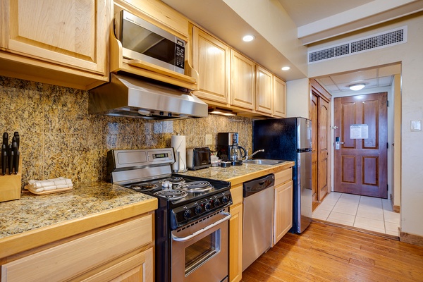 Your fully equipped kitchen features granite countertops, stainless steel appliances, and everything you need to prepare delicious home-cooked meals during your stay.