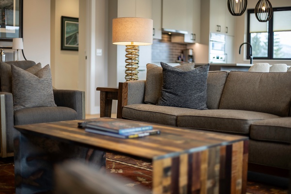 Sink into plush sofas and lose yourself in a good book in this inviting living area, where natural light and thoughtful design create the perfect spot to unwind after a day of exploring.