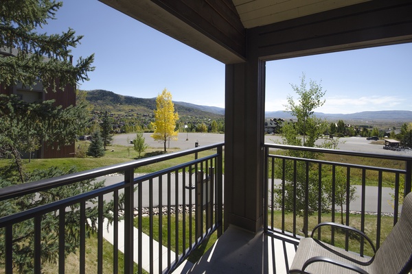 Step onto your private balcony and take in sweeping mountain and valley vistas framed by evergreens and open skies—a peaceful retreat awaits you.