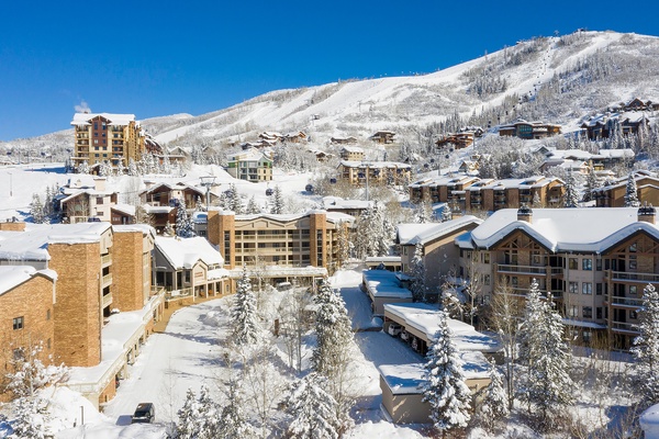 Nestled in a world-renowned ski resort, the property sits among snow-covered peaks and evergreens, offering easy access to alpine adventure and mountain village charm.