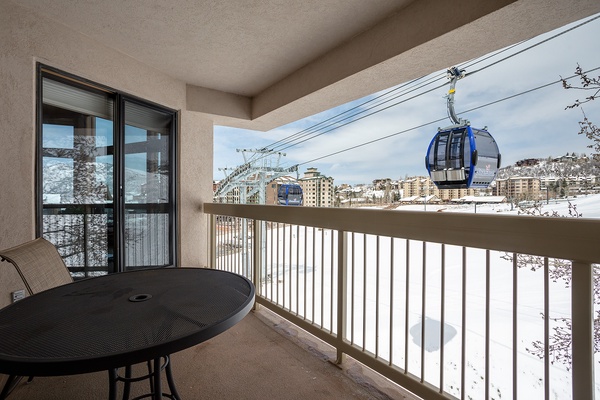 Sip your morning coffee on your private balcony while watching the gondola glide by—mountain adventures just steps away.