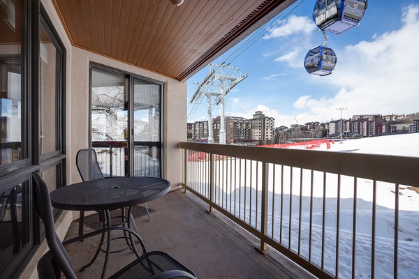 Private balcony overlooks the ski slopes and gondola, offering a front-row seat to the mountain action with scenic resort views and fresh alpine air.