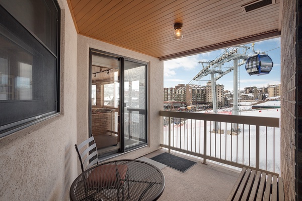 This balcony offers a prime view of the ski resort's gondola lift and village base, putting you steps from all the mountain action and après-ski scene.