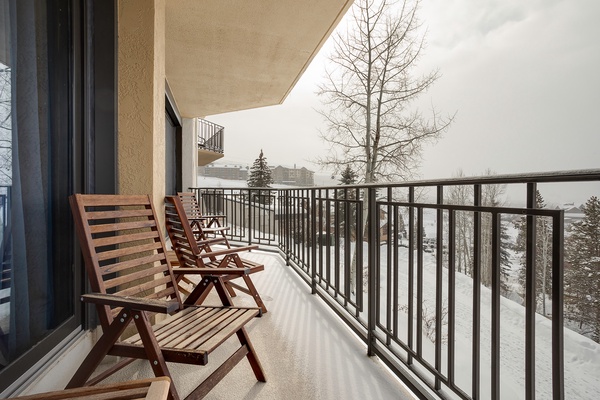 A private balcony with snowy mountain views offers the perfect spot to sip your morning coffee while taking in the winter landscape and crisp alpine air.