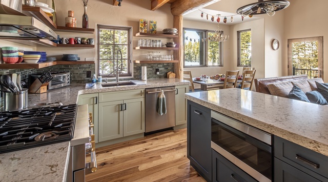 Your spacious kitchen features granite counters, stainless appliances, and rustic beams - perfect for cooking memorable meals.