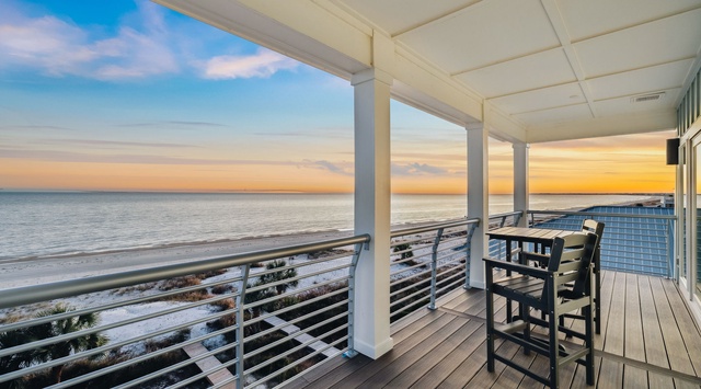 Step onto your private beachfront balcony where morning coffee tastes better with endless ocean views and golden sunrises painting the sky.