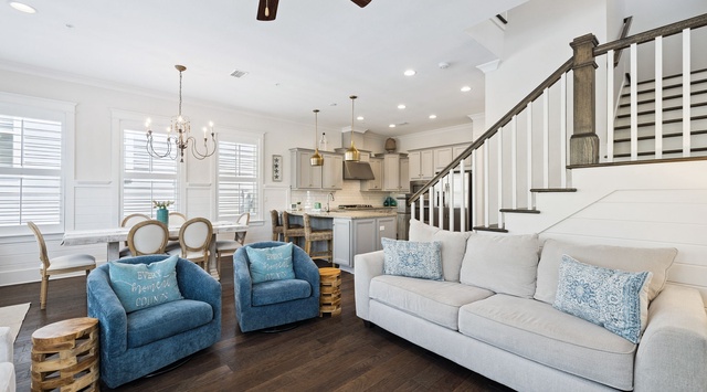 Your bright, open living space flows seamlessly from plush seating to gourmet kitchen, perfect for gathering with loved ones.