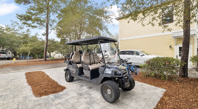 Complimentary golf cart parked and ready for your convenience, making it easy to explore the area in style.
