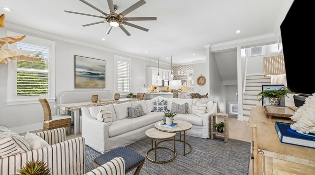 Your bright, breezy living space welcomes you with plush seating, coastal décor, and an airy open layout—perfect for unwinding or gathering with loved ones after a day of adventure.