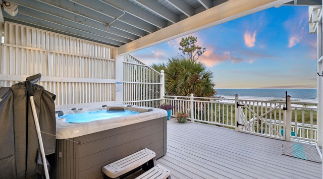 Unwind in your private hot tub on the covered deck, where coastal breezes and the sound of waves create the perfect retreat after a day at the beach.