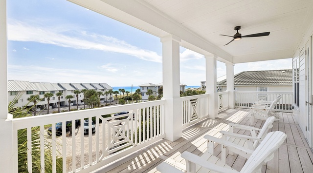 Relax on your private covered terrace, where comfortable lounge chairs and glimpses of the sparkling ocean invite you to unwind in the coastal breeze.