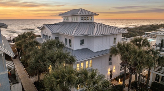 Stunning beachfront property with panoramic ocean views and tropical landscaping, perfectly positioned for coastal relaxation.