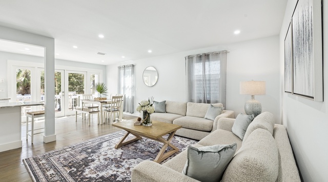 Sink into plush sectional seating while natural light streams through your windows, creating the perfect spot to unwind after exploring.