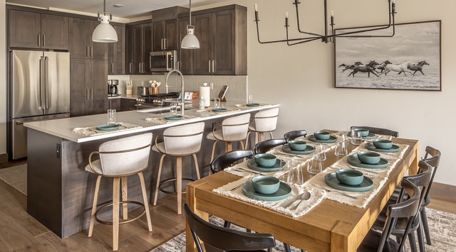 Your modern kitchen flows seamlessly into the dining space, where you'll create memorable meals with premium appliances and gather around the stylish table for intimate dinners.