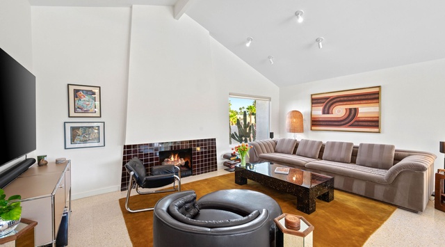 Sink into the plush sectional and warm up by your private fireplace while enjoying your favorite shows on the wall-mounted TV.