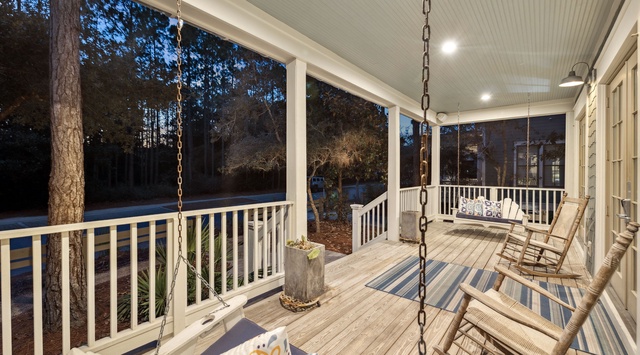 Swing gently on your private porch swing while rocking chairs await peaceful evening conversations.