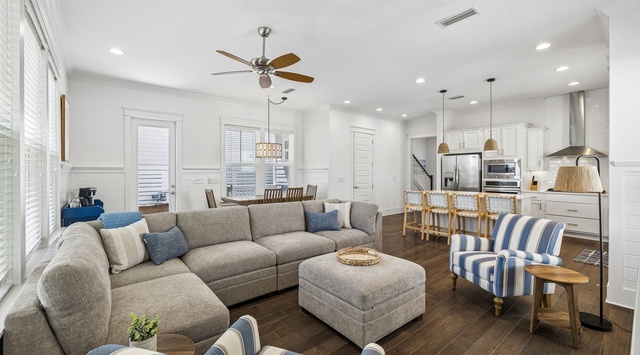 Relax in your open-concept retreat, where coastal charm meets modern comfort. Sink into the sectional, whip up meals in the chef-ready kitchen, or gather around the dining table for unforgettable moments.