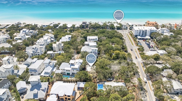 Aerial view showcasing the property's prime location near pristine beaches and coastal community amenities.
