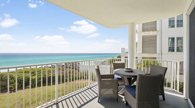 Your private balcony offers stunning oceanfront views where you'll enjoy morning coffee and evening sunsets over crystal-clear waters.