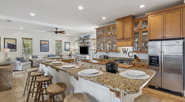 Your spacious kitchen island becomes the heart of gathering, with granite countertops perfect for morning coffee and evening conversations.