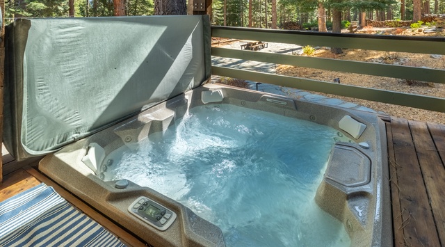 Soak away your cares in your private hot tub, surrounded by towering pines and fresh mountain air—your perfect forest retreat awaits.