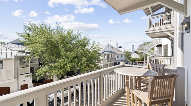 Step onto your private balcony and soak in peaceful neighborhood views while enjoying morning coffee at your bistro table.