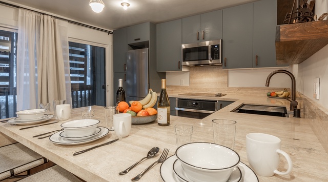 Your fully equipped modern kitchen invites culinary adventures with sleek countertops, stainless steel appliances, and everything thoughtfully arranged for your comfort.