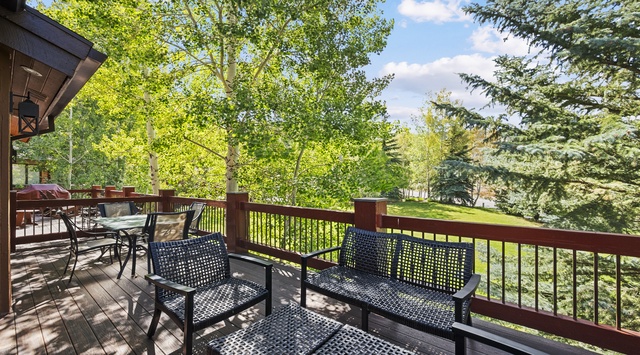 Relax on your private deck surrounded by lush aspens and evergreens. Sip morning coffee at the patio table or unwind in comfortable seating while soaking in the peaceful mountain air.
