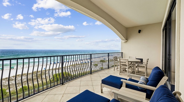 Unwind on your private balcony with plush lounge chairs and stunning sea views. Listen to the waves and soak in the coastal breeze from this peaceful retreat.