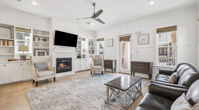 Relax in your elegant living space with cozy fireplace, built-in entertainment center, and comfortable seating for unwinding after your adventures.
