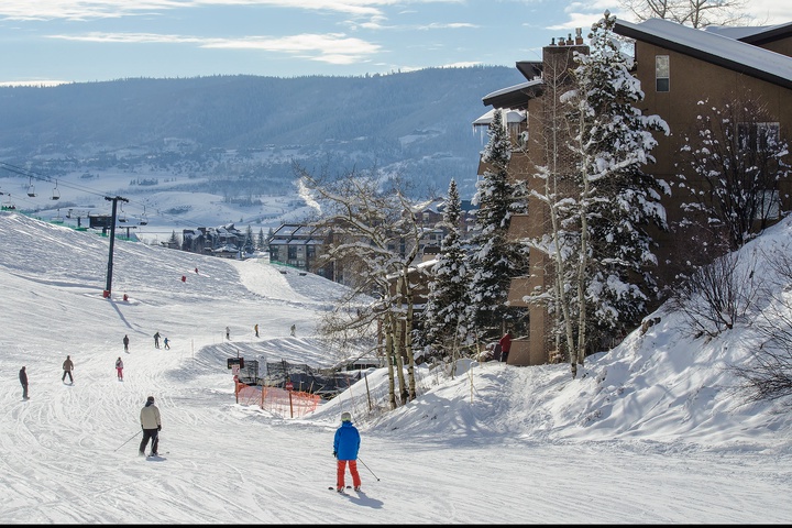 The property sits slopeside in a premier winter destination, offering direct access to pristine ski runs and spectacular mountain scenery throughout your alpine getaway.