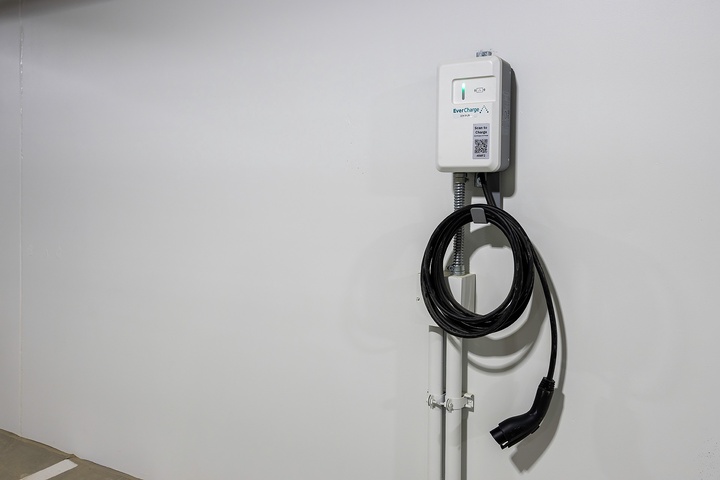 Electric vehicle charging station available on-site for your convenience during your stay.