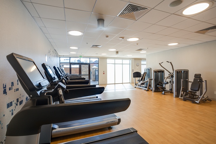 Stay active during your getaway in this bright, spacious fitness center with treadmills and strength equipment ready for your workout.
