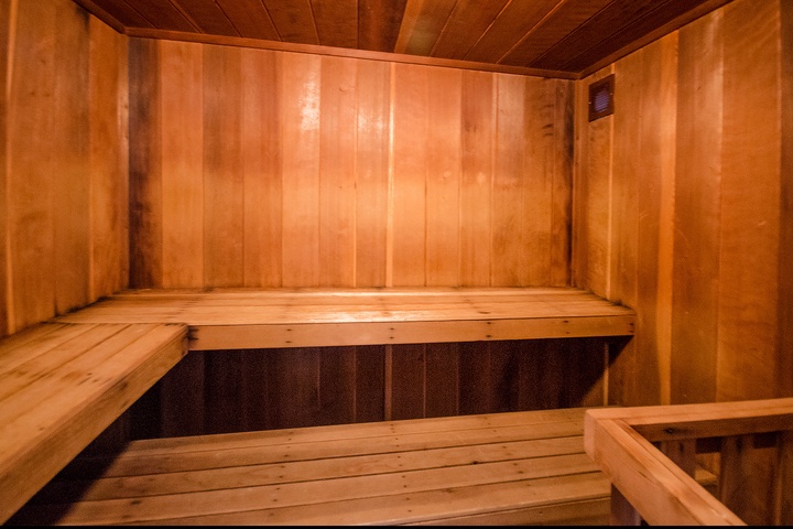 Step into this warm wooden sauna and let the gentle heat melt away your stress. Two levels of smooth benches invite you to relax in peaceful comfort.